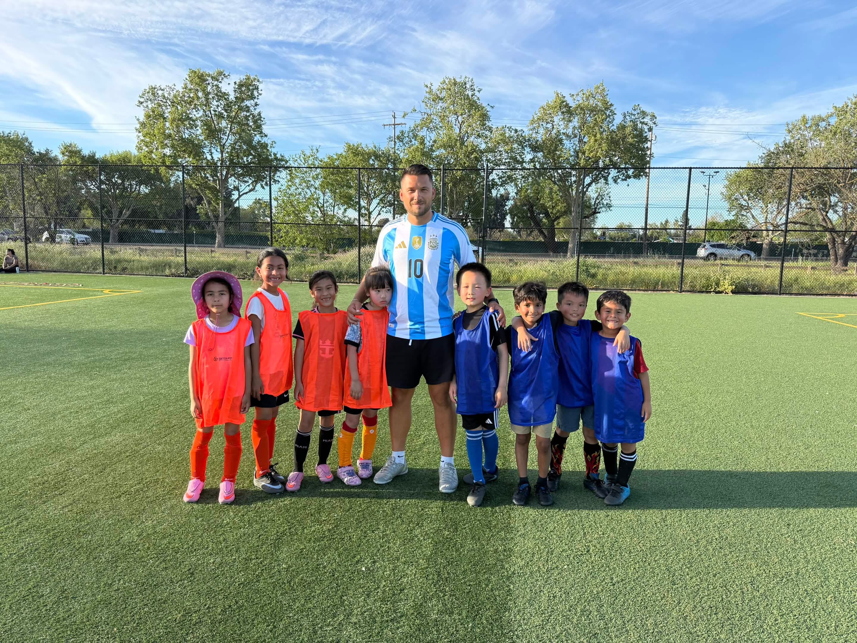 Coach with small group of young players